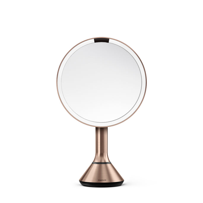 Side profile view of Simplehuman Rose Gold Sensor Mirror Round showing the adjustable stand and pivot mechanism.