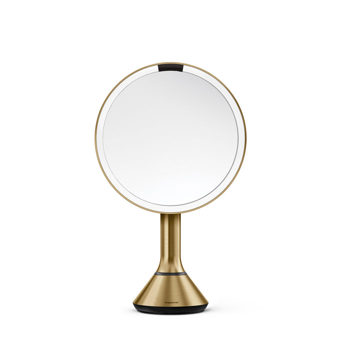 Side profile, Simplehuman Brushed Brass Sensor Mirror Round highlighting the adjustable pivoting tilt feature.