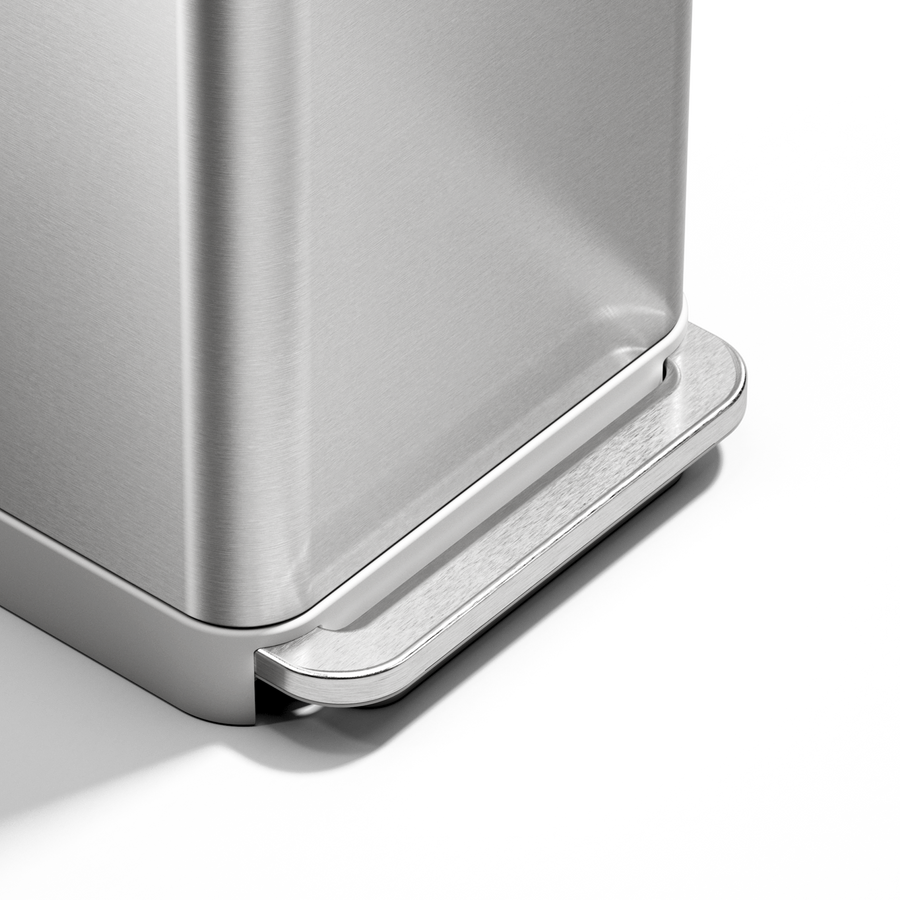 Close-up of Simplehuman 45L Brushed Stainless Steel Step Can foot pedal, hands-free operation.