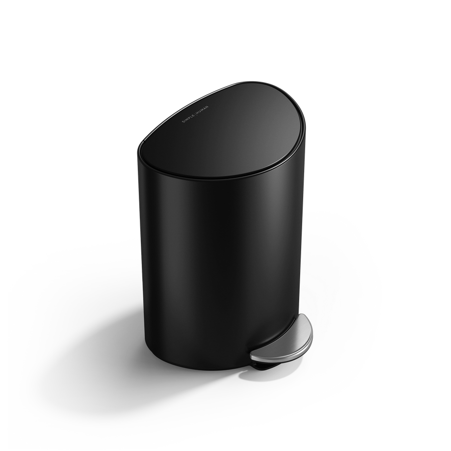 Simplehuman 6L Semi-Round Step Can in Matte Black, angled view, durable metal pedal provides hands-free operation.