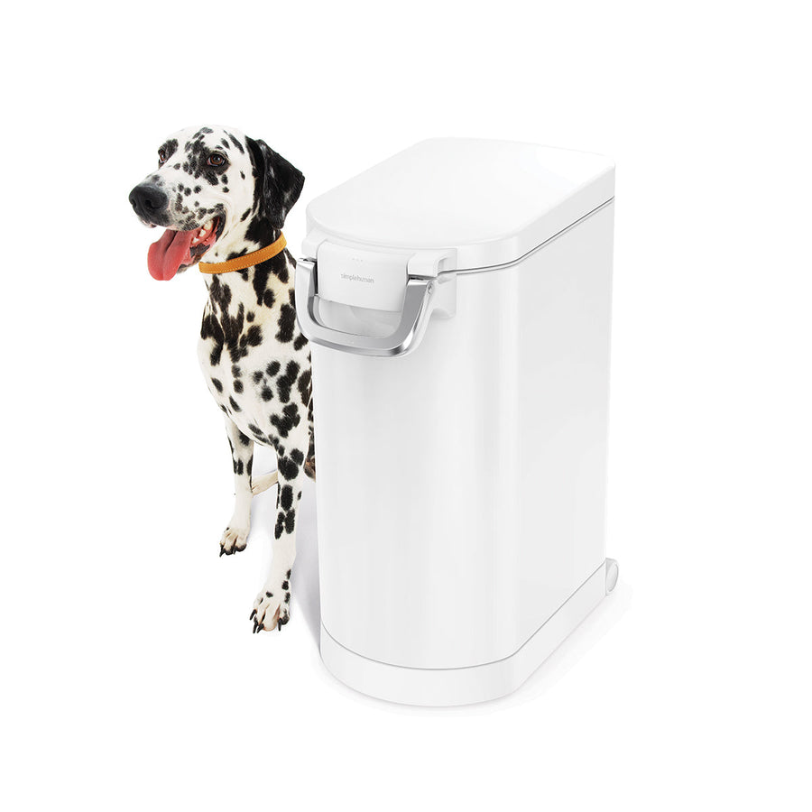 Front view of Simplehuman White Large Pet Food Can next to Dalmatian, airtight locking handle.