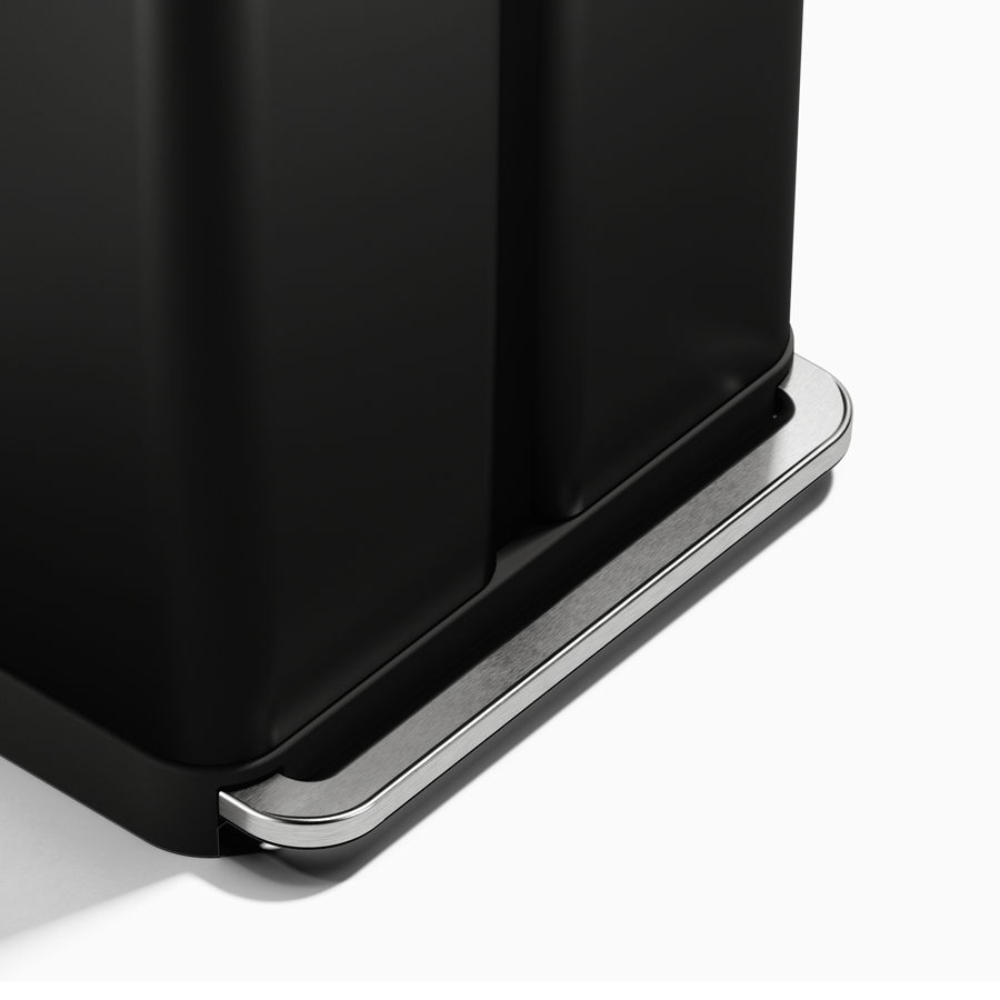 Detail view of Simplehuman 58L Matte Black Step Recycler brushed steel pedal mechanism for hands-free use.