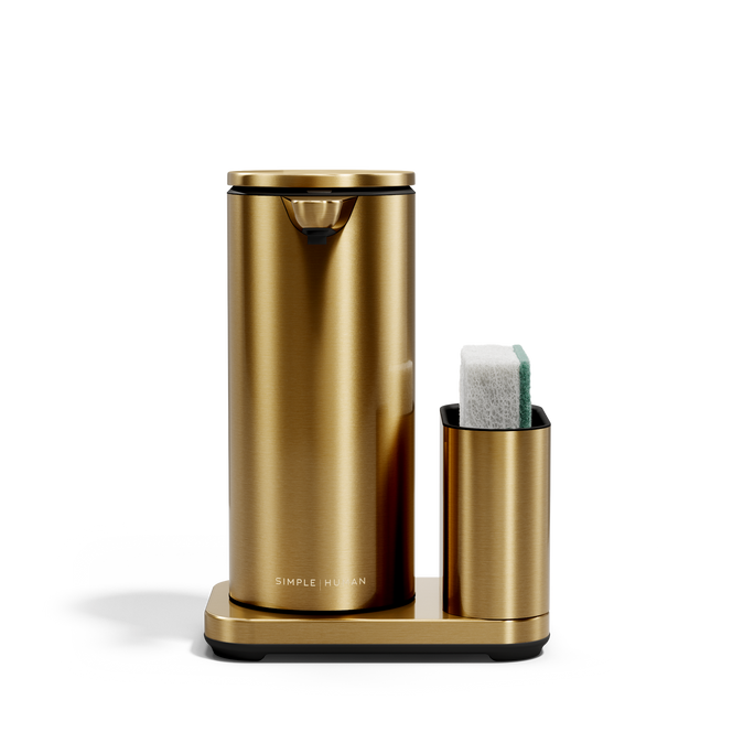 Simplehuman Brass 14 oz Sensor Pump + Caddy, touch-free rechargeable dispenser holding a sponge.