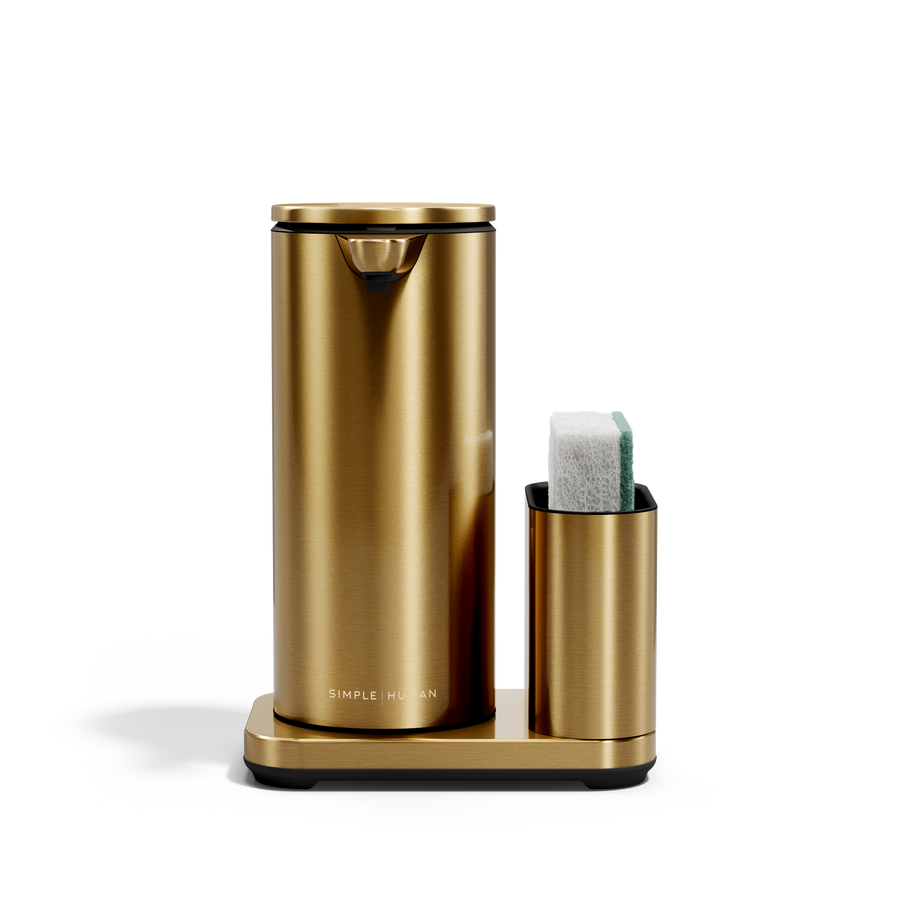 Simplehuman Brass 14 oz Sensor Pump + Caddy, touch-free rechargeable dispenser holding a sponge.