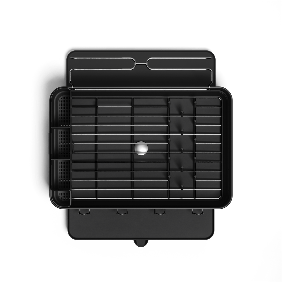 Overhead view of Simplehuman Matte Black Steel Frame Dishrack, showing central drain plug and integrated cup holders.