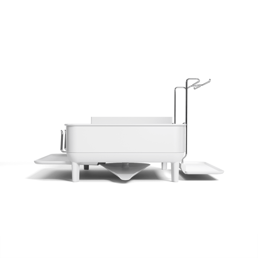 Side view of Simplehuman White Steel Frame Dishrack featuring the integrated stainless steel cup rack and central pivoting drain spout.