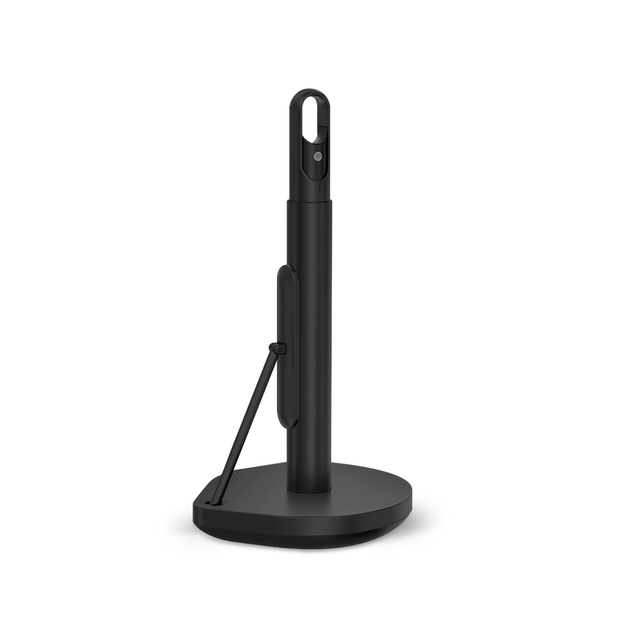 Angled view of Simplehuman Matte Black Paper Towel Holder showing spray bottle holster and tear arm.