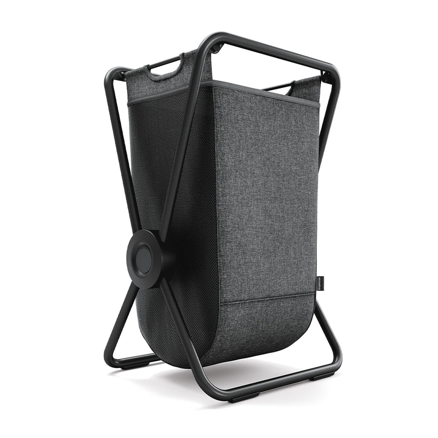Angled view of Simplehuman Single X-Frame Hamper, Matte Black frame, gray removable liner with breathable mesh.