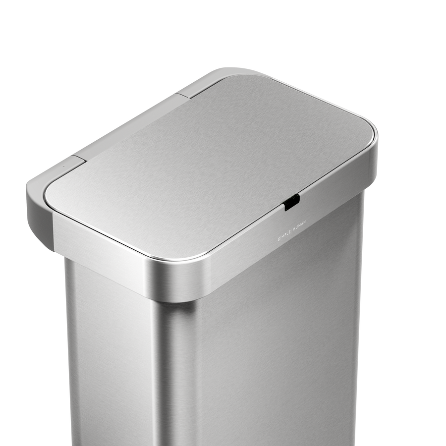 Detail view of Simplehuman 58L Rectangular Sensor Can in Brushed Stainless Steel showing touch-free sensor lid.