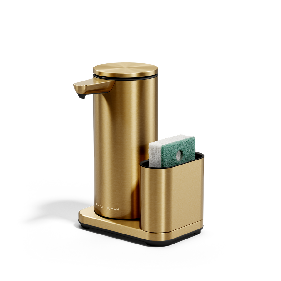 Angled view: Simplehuman Brass 14 oz Sensor Pump + Caddy holding a sponge, touch-free, rechargeable.