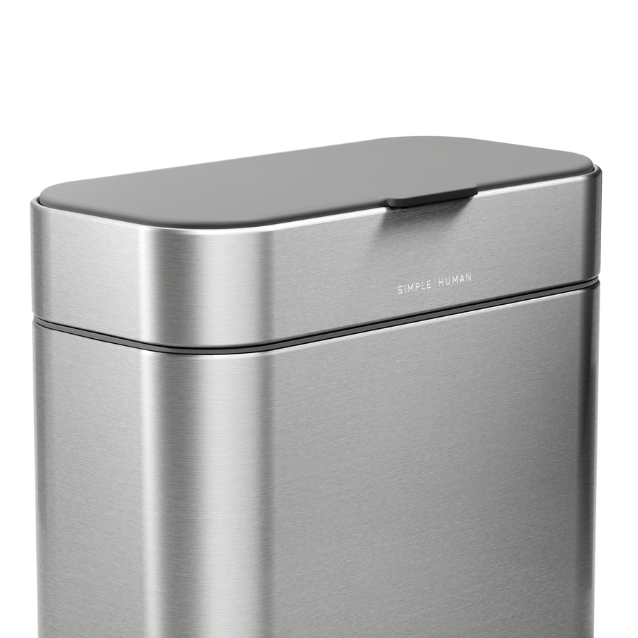 Detail view of Simplehuman Brushed Stainless Steel Compost Caddy, showing the gray lid resting flush for an odor-proof seal.