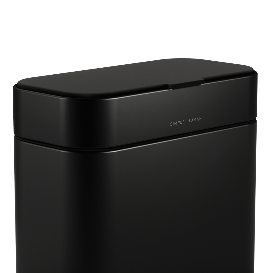 Close-up of Simplehuman Matte Black Compost Caddy showing branding and tight, odor-proof lid seal.