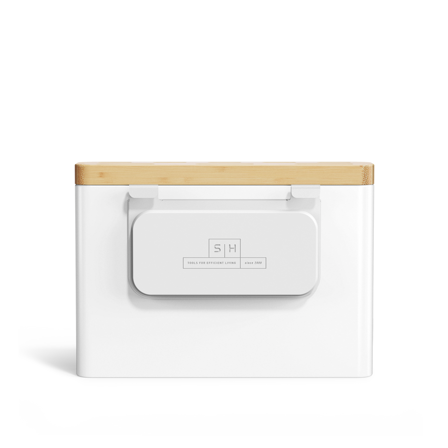 Detail view of Simplehuman White Knife Block with Bamboo top, centered branding plate/utensil hook attachment.