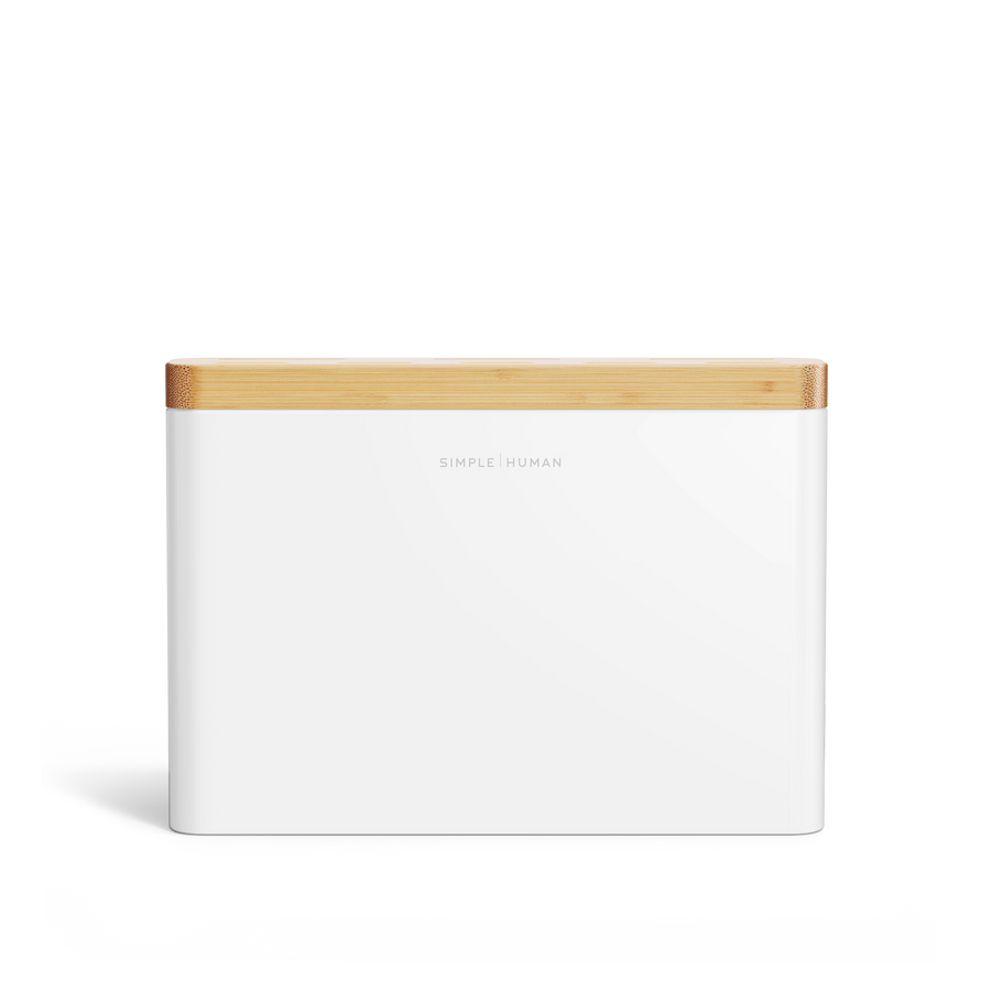 Simplehuman White Knife Block with Bamboo top, isolated studio shot highlighting the clean front face and centered branding.