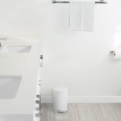 4.5L round step can - white finish - lifestyle in bathroom near sink