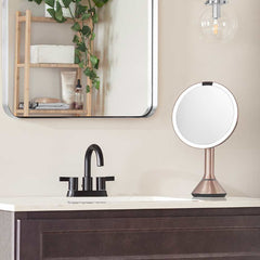 sensor mirror with touch-control brightness and dual light setting - rose gold finish - lifestyle in bathroom image