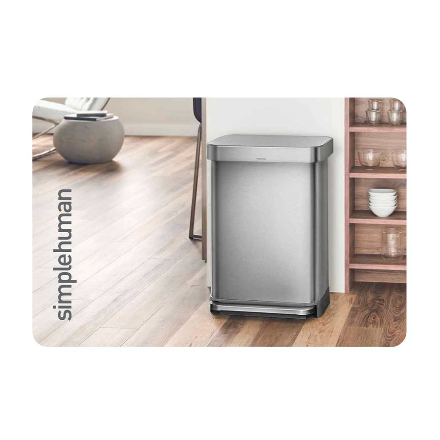 Simplehuman Brushed Stainless Steel rectangular Step Can in a kitchen, hands-free foot pedal and space-saving design.