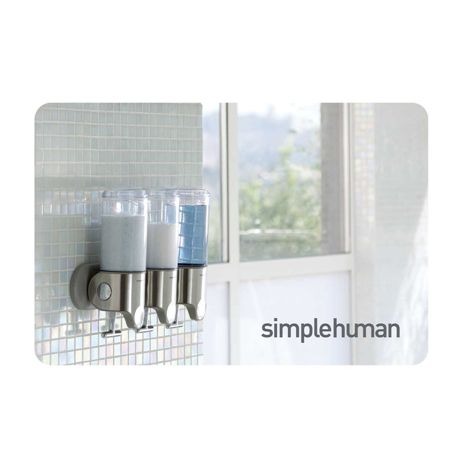 Simplehuman Triple Wall Mount Soap Dispenser in Brushed Stainless Steel on shower wall, space-saving design.